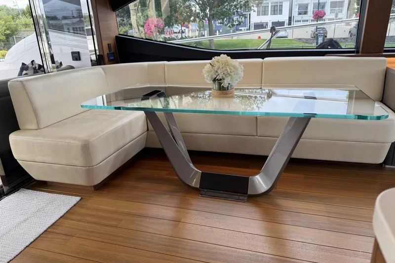 Slide: The Image of Luxurious interior of 2020 Princess S78 yacht with elegant glass table and plush seating. - 41