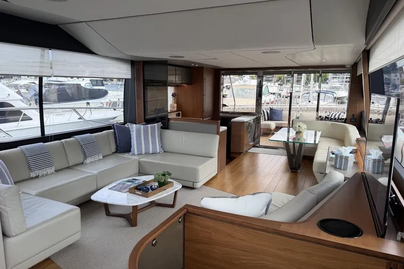 Slide: The Image of Luxurious interior of 2020 Princess S78 yacht with elegant seating and marina view. - 21