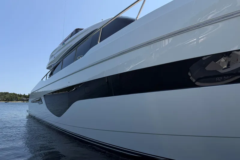 Slide: The Image of Luxurious 2020 Princess S78 yacht on serene water, showcasing sleek design and elegance. - 103