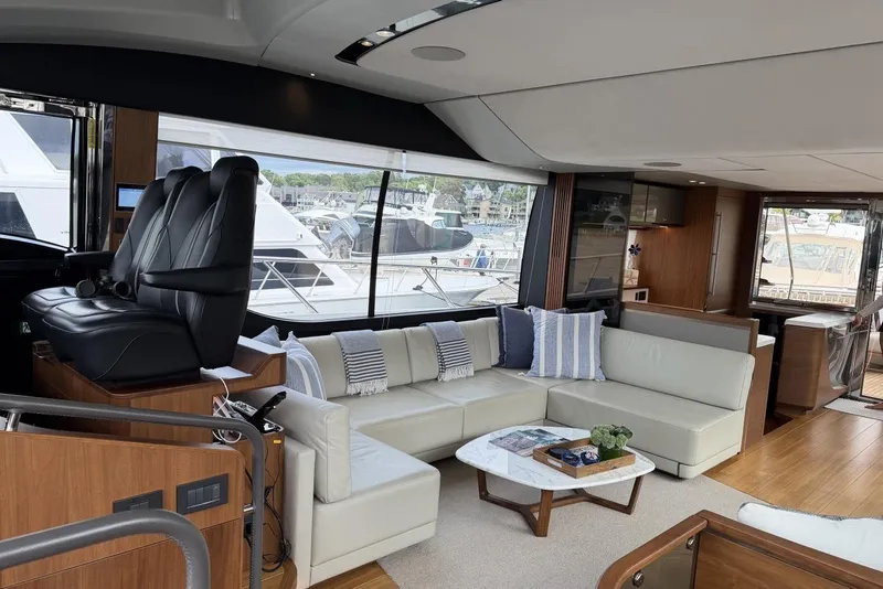 Slide: The Image of Luxurious interior of a 2020 Princess S78 yacht with elegant seating and modern design. - 23