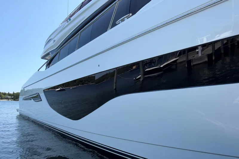 Slide: The Image of 2020 Princess S78 yacht side view on water, showcasing sleek design and luxury features. - 3