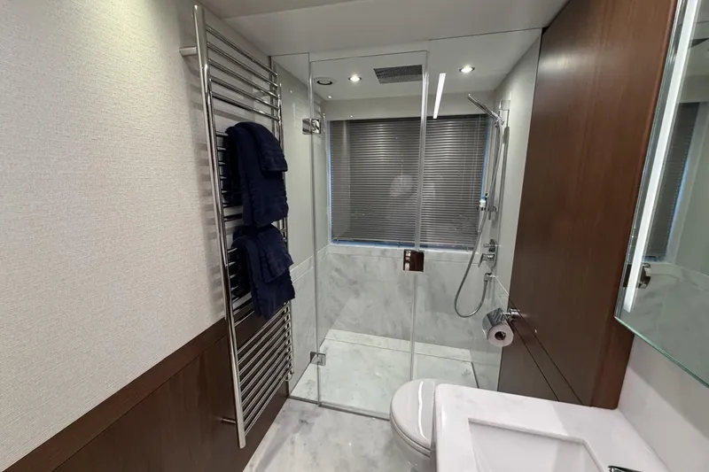 Slide: The Image of Luxurious bathroom in 2020 Princess S78 yacht with modern shower and towel rack. - 58