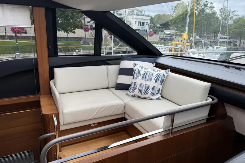 Slide: The Image of Luxurious interior of 2020 Princess S78 yacht with elegant white seating and decorative pillows. - 28