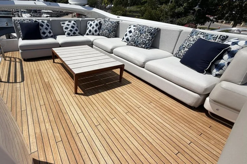 Slide: The Image of Luxurious 2020 Princess S78 yacht deck with elegant seating and decorative cushions. - 70