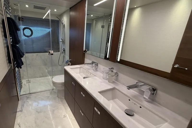 Slide: The Image of Luxurious bathroom in 2020 Princess S78 yacht with dual sinks and glass shower. - 56