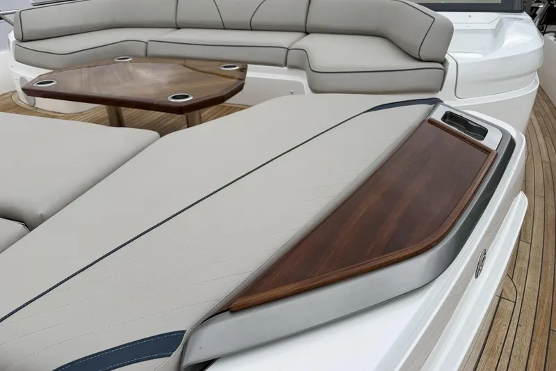 Slide: The Image of Luxurious seating area on 2020 Princess S78 yacht with elegant wood accents. - 83