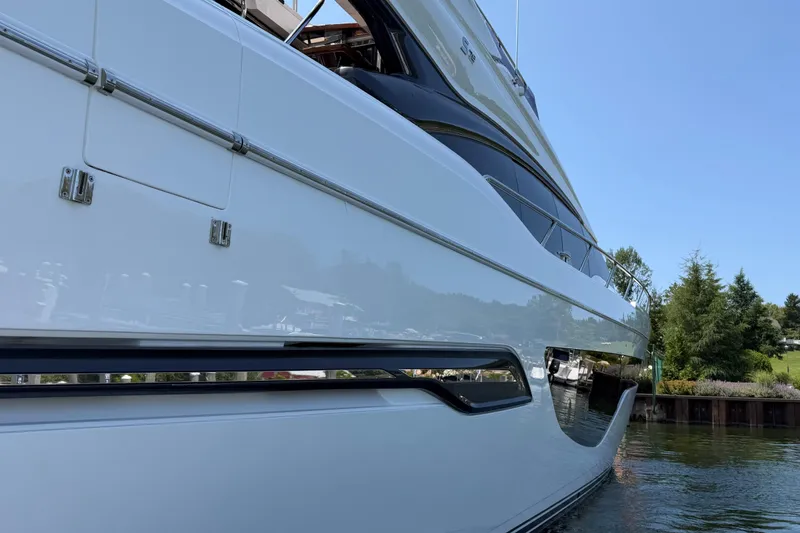 Slide: The Image of 2020 Princess S78 yacht docked, showcasing sleek design and luxury features. - 102