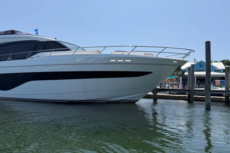 Slide: The Image of Luxury 2020 Princess S78 yacht docked at marina, showcasing sleek design and elegance. - 106