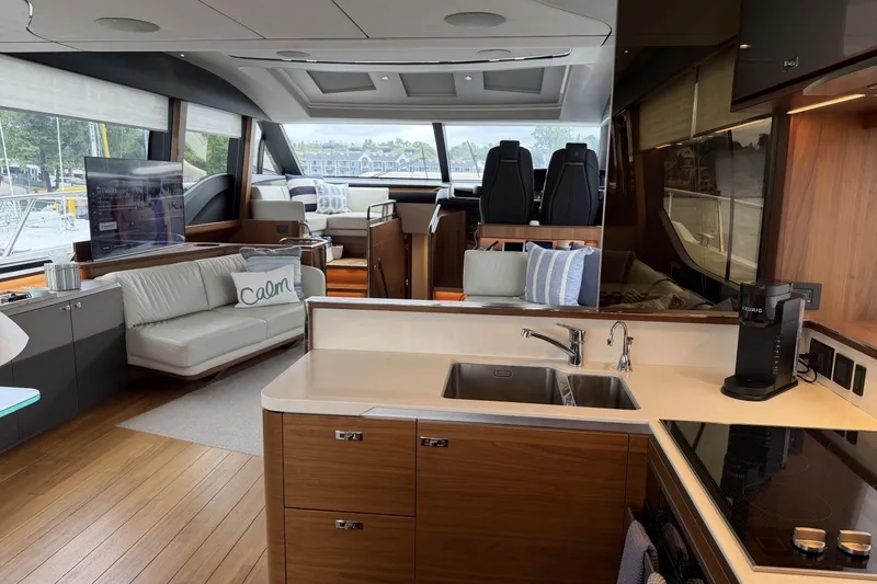 Slide: The Image of Luxurious interior of 2020 Princess S78 yacht with modern kitchen and seating area. - 33