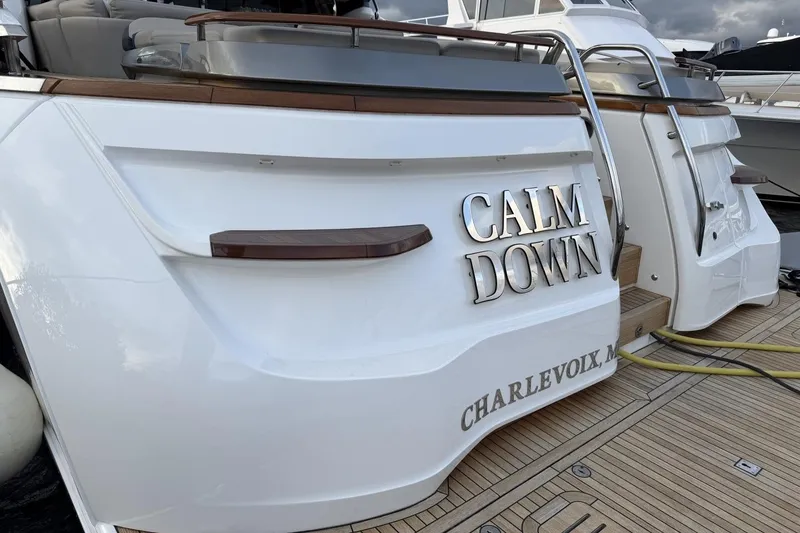 Slide: The Image of Luxury yacht "Calm Down" docked, Princess S78 model, 2020, Charlevoix, Michigan. - 4