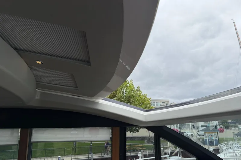 Slide: The Image of Interior view of 2020 Princess S78 yacht with sleek ceiling design and large windows. - 47