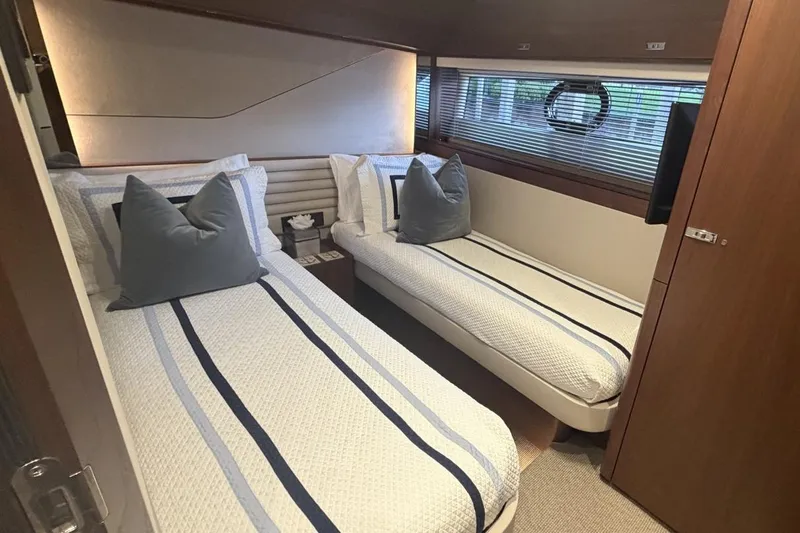 Slide: The Image of Luxurious twin cabin in 2020 Princess S78 yacht with elegant bedding and modern decor. - 65