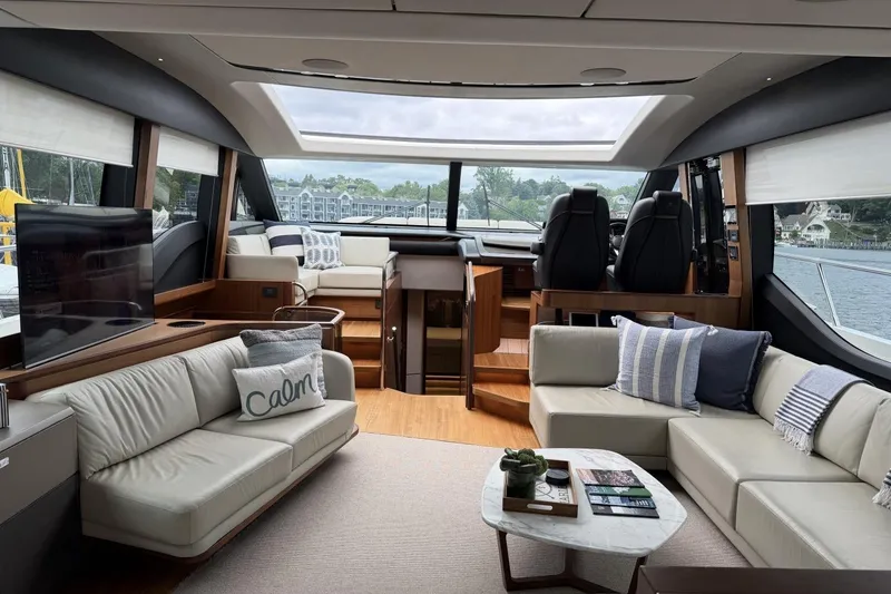 Slide: The Image of Luxurious interior of 2020 Princess S78 yacht with elegant seating and panoramic windows. - 22