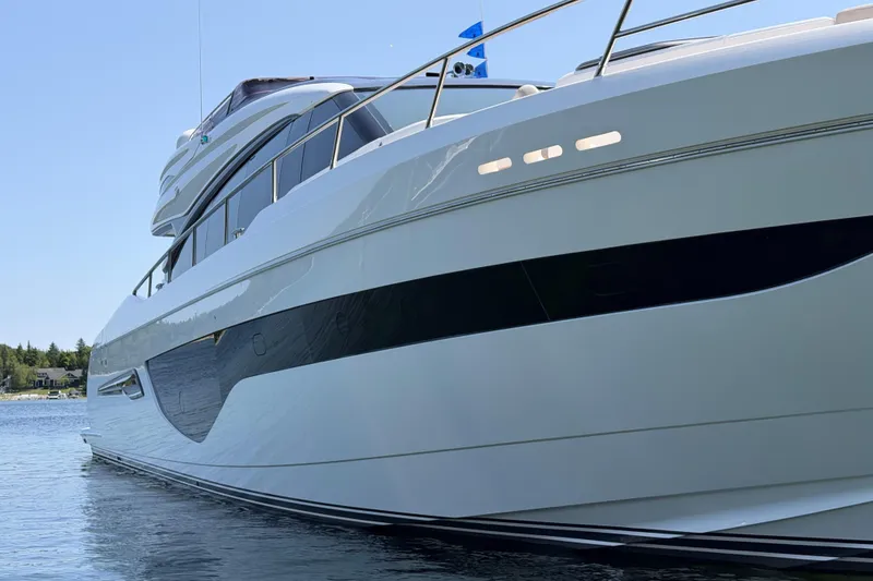 Slide: The Image of Luxurious 2020 Princess S78 yacht on serene water, showcasing sleek design and elegance. - 105