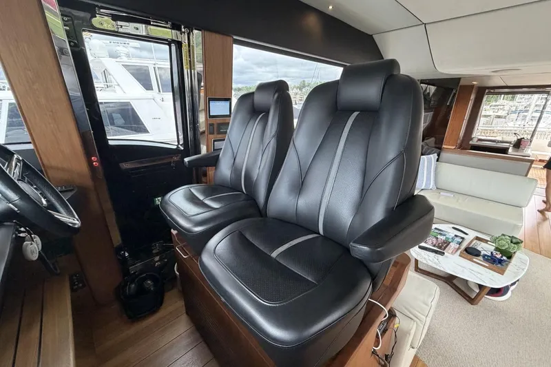 Slide: The Image of Luxurious interior of 2020 Princess S78 yacht with black leather seats and modern design. - 31