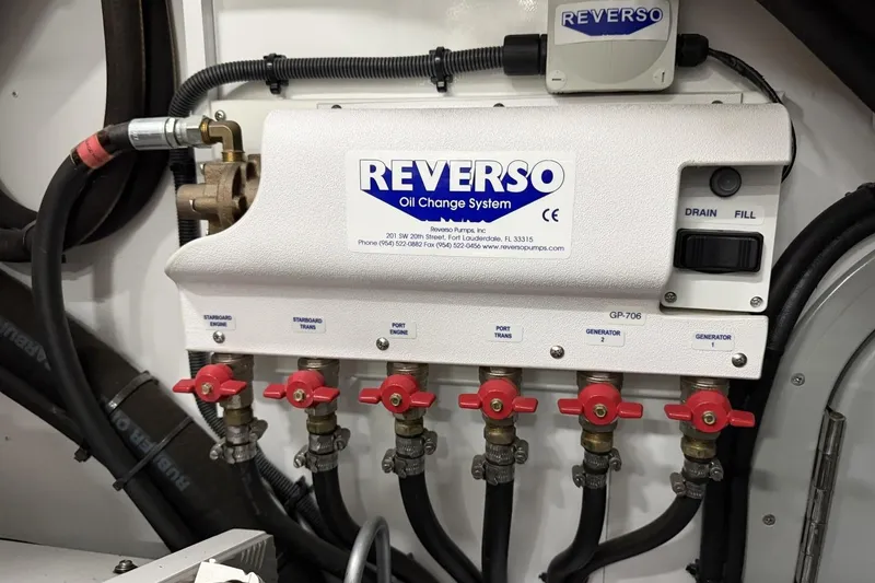 Slide: The Image of Reverso oil change system in a 2020 Princess S78 yacht engine room. - 99
