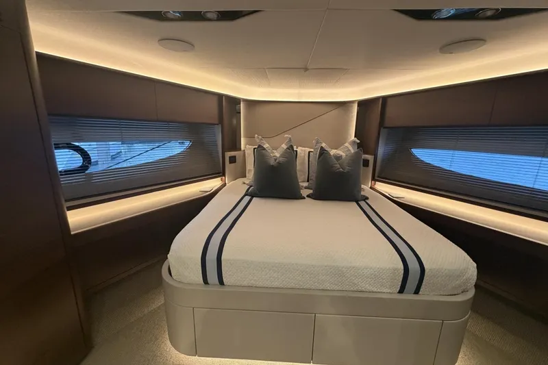 Slide: The Image of Luxurious bedroom interior of 2020 Princess S78 yacht with modern design and ambient lighting. - 60
