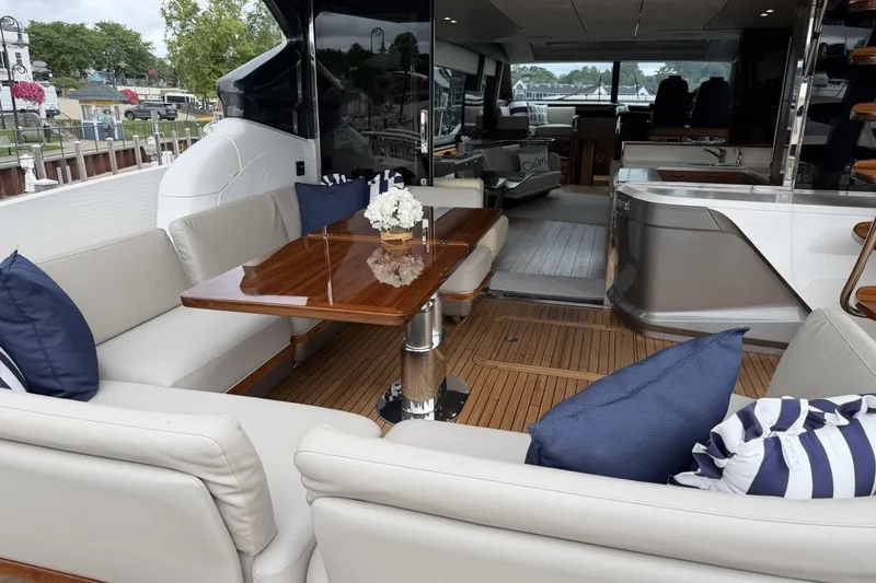 Slide: The Image of Luxurious 2020 Princess S78 yacht interior with elegant seating and wooden table. - 19
