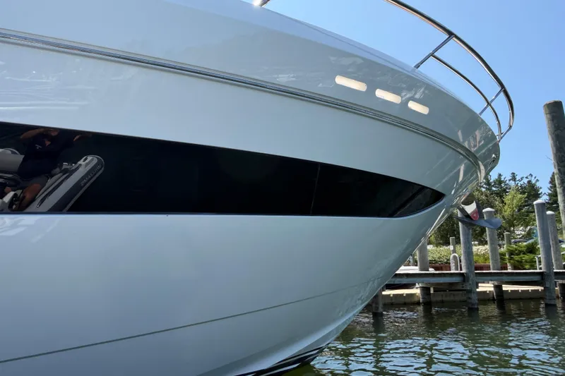 Slide: The Image of 2020 Princess S78 yacht docked, showcasing sleek design and modern features. - 104
