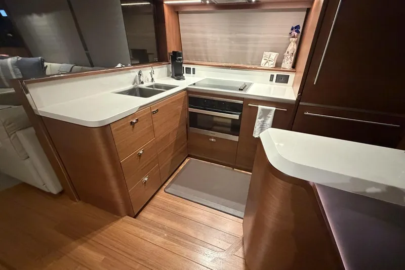 Slide: The Image of Luxurious kitchen interior of 2020 Princess S78 yacht with modern appliances and wooden cabinetry. - 35