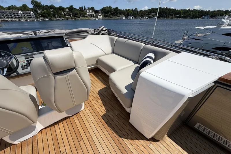 Slide: The Image of Luxurious 2020 Princess S78 yacht interior with plush seating and elegant design on a sunny day. - 71
