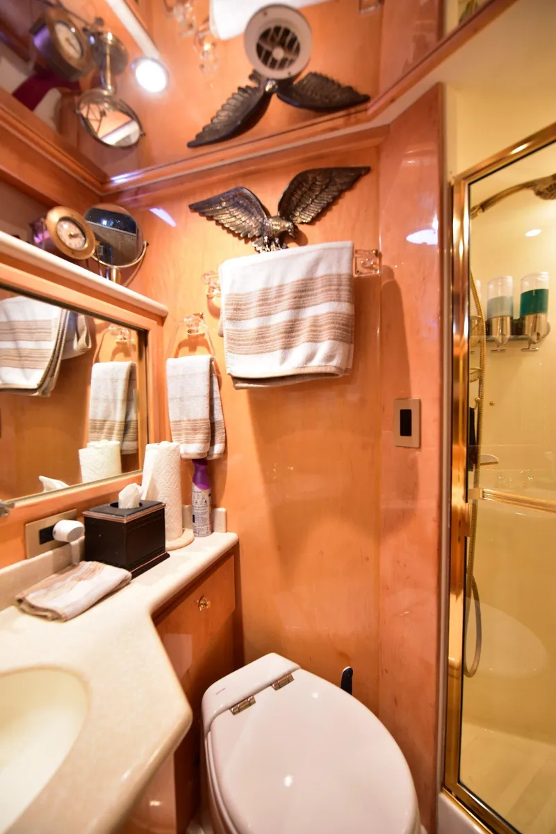 Slide: The Image of Luxurious 2004 Navigator Rival yacht bathroom with elegant decor and modern amenities. - 30