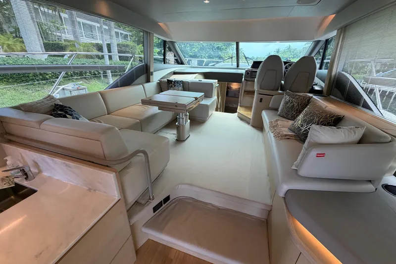Slide: The Image of Luxurious interior of a 2018 Princess F55 yacht with elegant seating and modern design. - 8