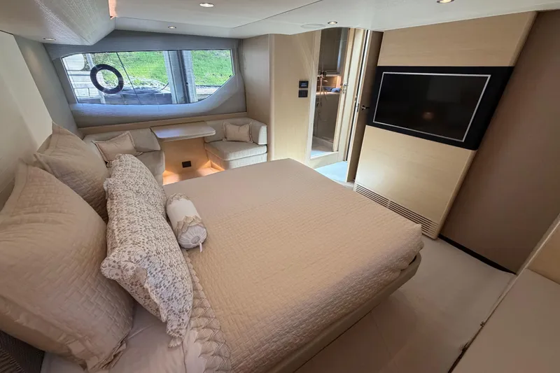 Slide: The Image of Luxurious 2018 Princess F55 yacht bedroom with elegant decor and modern amenities. - 15