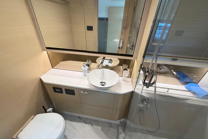 Slide: The Image of Luxurious bathroom interior of 2018 Princess F55 yacht with modern fixtures and elegant design. - 18