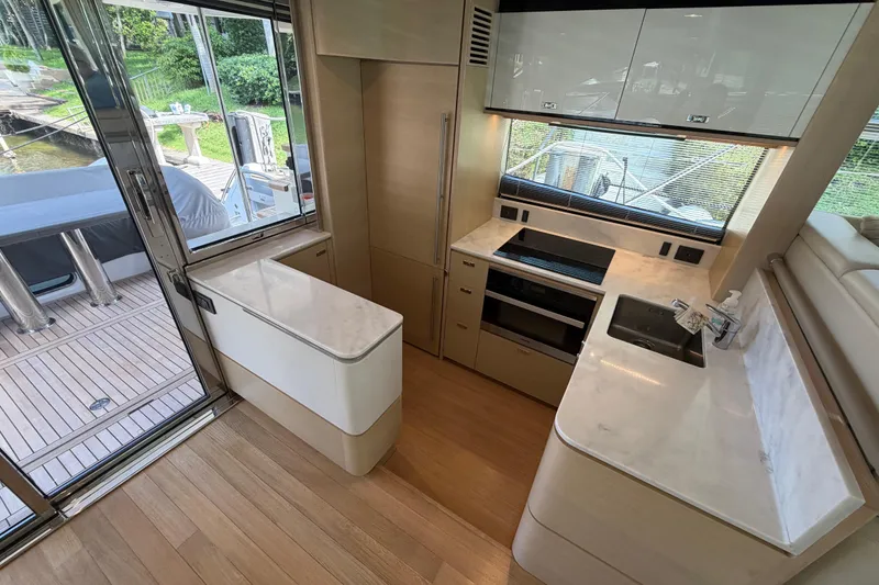 Slide: The Image of Luxurious 2018 Princess F55 yacht kitchen with modern appliances and sleek design. - 5