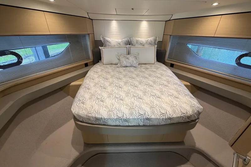 Slide: The Image of Luxurious 2018 Princess F55 yacht bedroom with elegant bedding and modern design. - 19