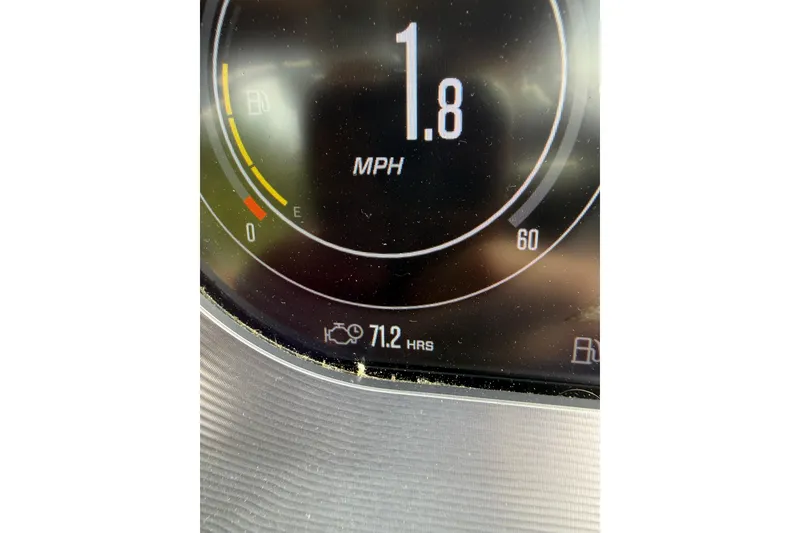 Slide: The Image of 2024 MasterCraft X24 dashboard displaying 1.8 MPH and 71.2 engine hours. - 16