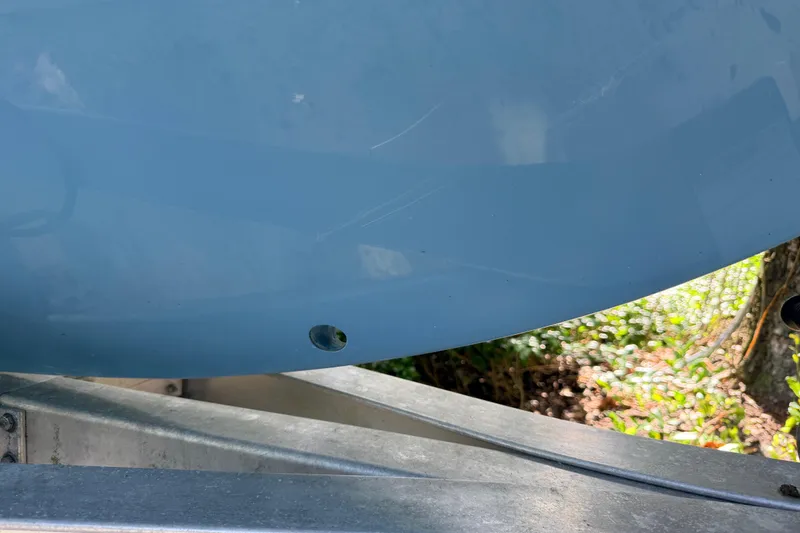 Slide: The Image of Close-up of a 2013 Hell's Bay Biscayne boat hull on a trailer. - 33