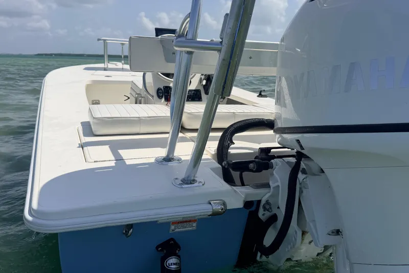 Slide: The Image of 2013 Hell's Bay Biscayne boat with Yamaha engine on calm waters. - 24