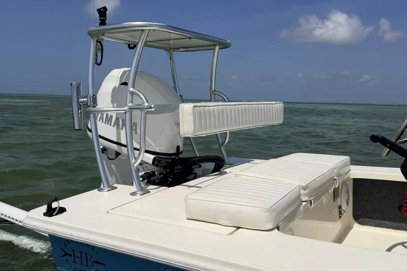 Slide: The Image of 2013 Hell's Bay Biscayne boat with Yamaha engine on calm waters. - 13