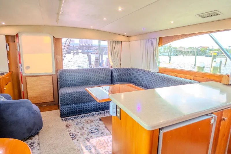 Slide: The Image of Luxurious interior of a 2000 Ocean Yachts 48 Super Sport with waterfront view. - 25