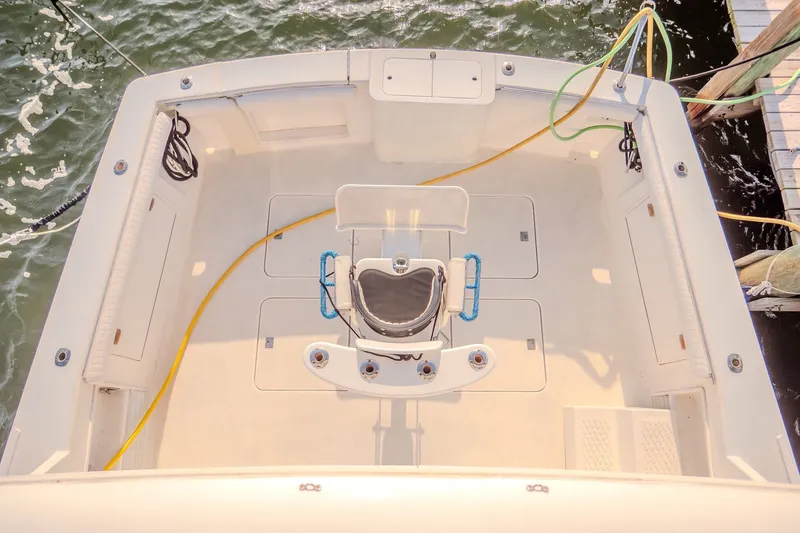 Slide: The Image of Cockpit view of 2000 Ocean Yachts 48 Super Sport, docked with fishing chair. - 14