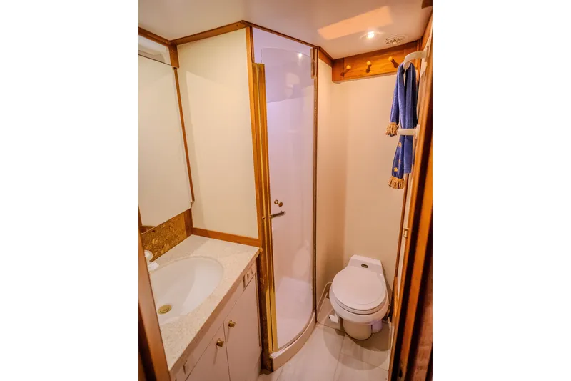 Slide: The Image of Bathroom interior of 2000 Ocean Yachts 48 Super Sport with shower and toilet. - 34
