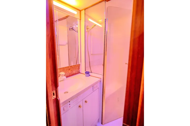 Slide: The Image of Bathroom interior of 2000 Ocean Yachts 48 Super Sport with shower and vanity. - 36