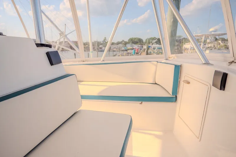 Slide: The Image of Interior seating area of a 2000 Ocean Yachts 48 Super Sport boat. - 23