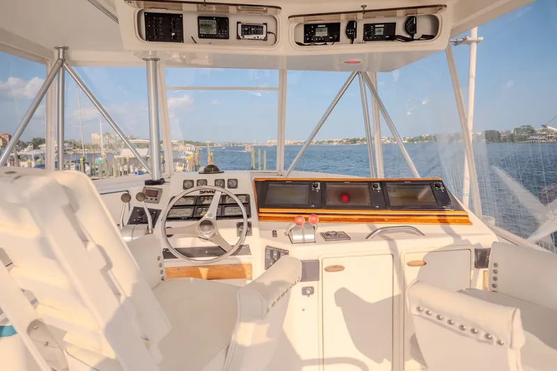 Slide: The Image of Helm of 2000 Ocean Yachts 48 Super Sport with ocean view and navigation equipment. - 20