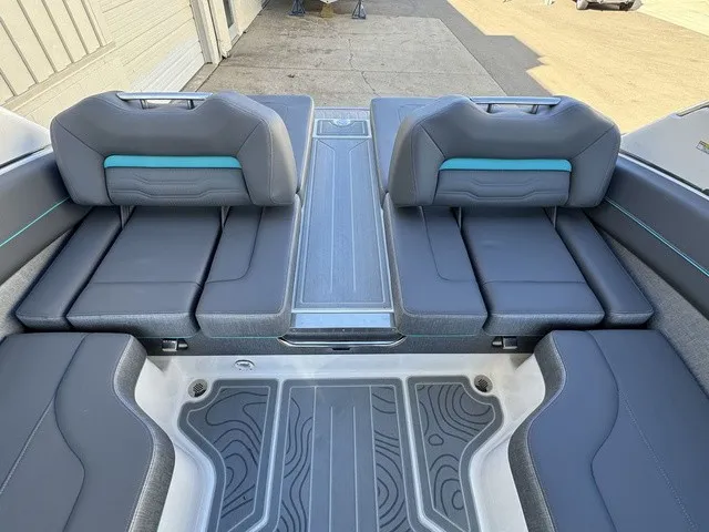 Slide: The Image of The image shows the cockpit of a 2024 Regal LS6 with stylish padded seats and modern design. - 17