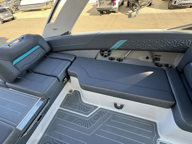 Slide: The Image of The image shows the cockpit of a 2024 Regal LS6 boat with stylish seating. - 18