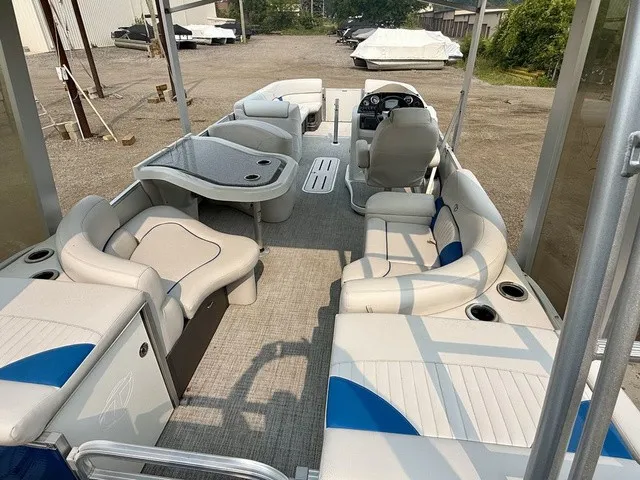 Slide: The Image of The image shows the spacious deck of a 2016 Tahoe 2785 Vista Fun Ship with comfortable seating. - 16