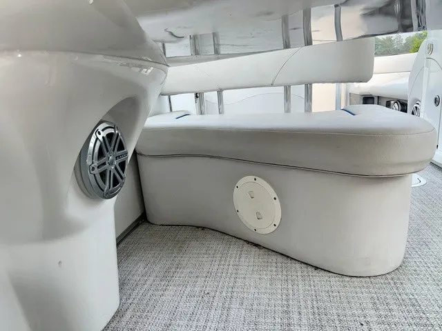 Slide: The Image of The image shows the interior of a 2016 Tahoe 2785 Vista Fun Ship with gray upholstery and speakers. - 20