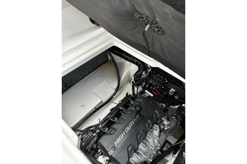 Slide: The Image of 2023 Yamaha Boats AR250 engine compartment showcasing high output engine components. - 18