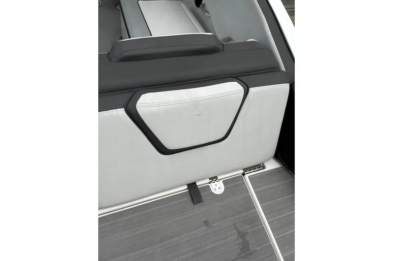 Slide: The Image of 2023 Yamaha Boats AR250 interior seating detail with sleek design and modern upholstery. - 25