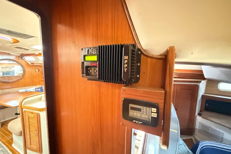 Slide: The Image of Interior of a 1995 Catalina 400 yacht featuring MPPT solar charge controller. - 35