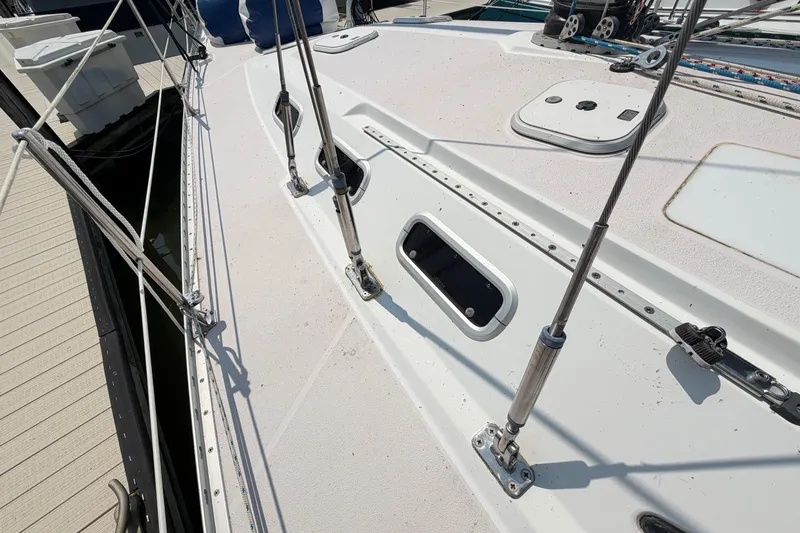 Slide: The Image of Deck of a 1995 Catalina 400 sailboat with rigging and hatches. - 16