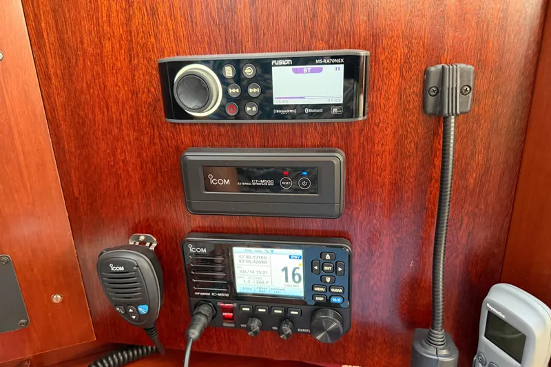 Slide: The Image of Control panel of a 2006 Beneteau 423 yacht with radio and navigation equipment. - 29